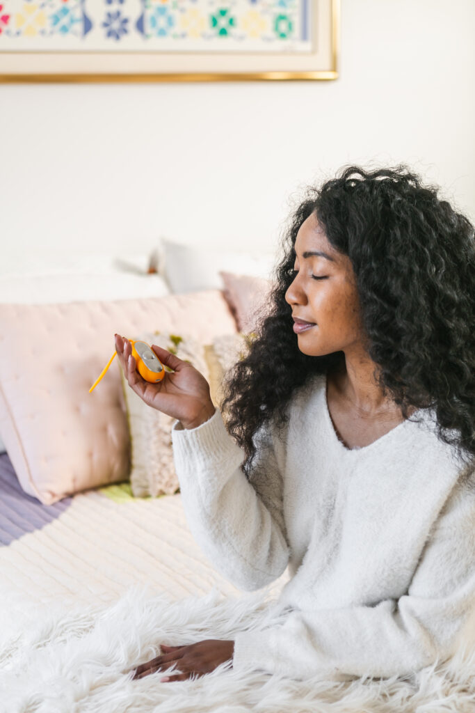 woman who has insomnia using 'The Chill Pill'