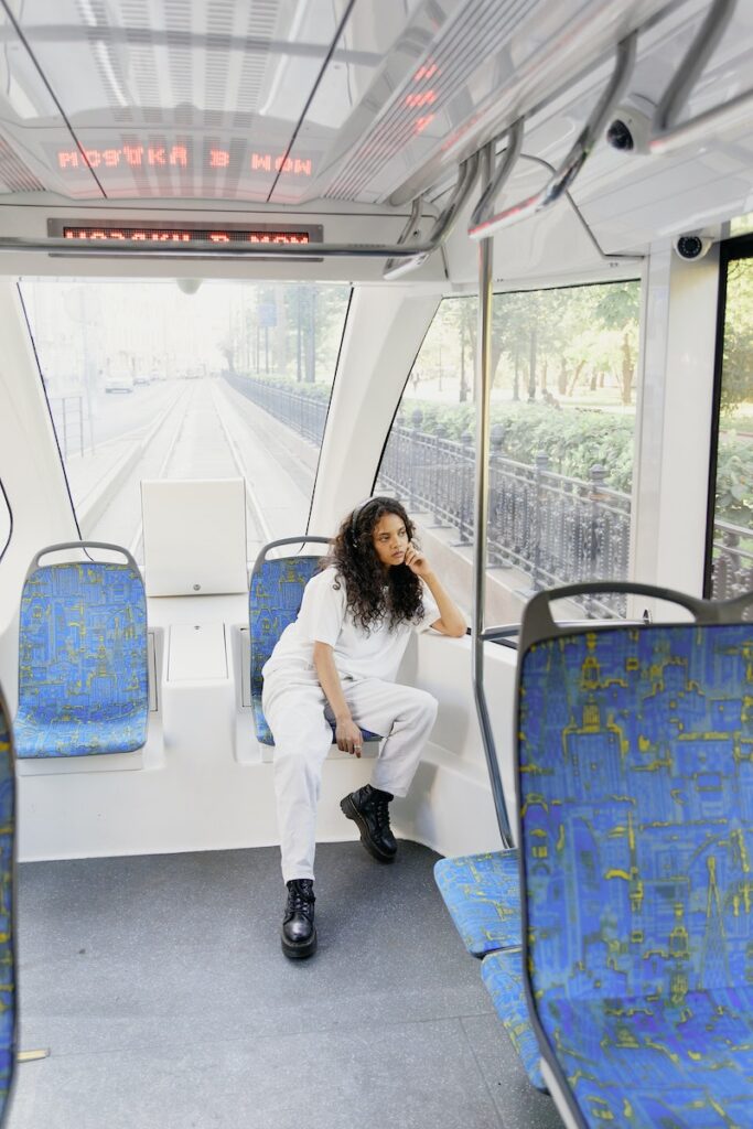 Woman Sitting Inside the Bus