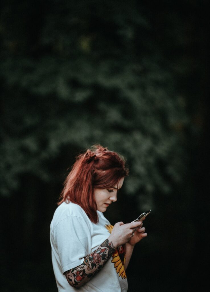 woman holding smartphone